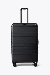 The Hybrid Check-In Roller in Black