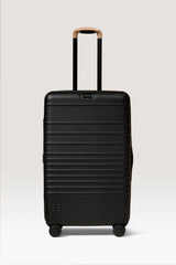 The Medium Check-In Roller in Black