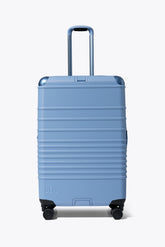 The Hybrid Check-In Roller in Dusty Blue